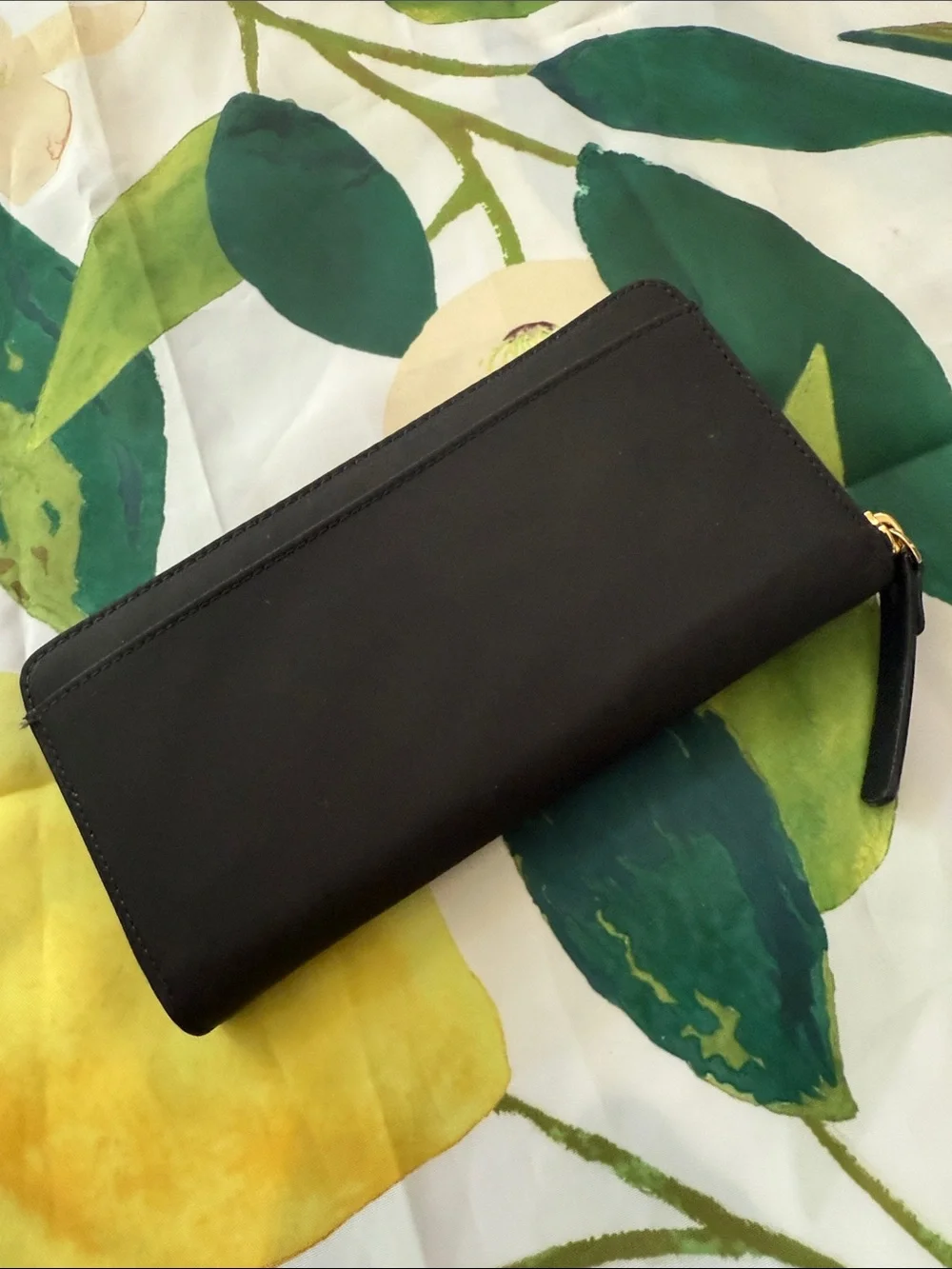 kate spade black zip-around wallet with gold plaque